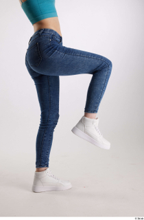 Rada  1 blue jeans casual dressed flexing leg side…